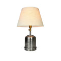 **Technische Titel in het Nederlands: Stijlvolle tafel lamp met metalen basis en stoffen lampenkap**